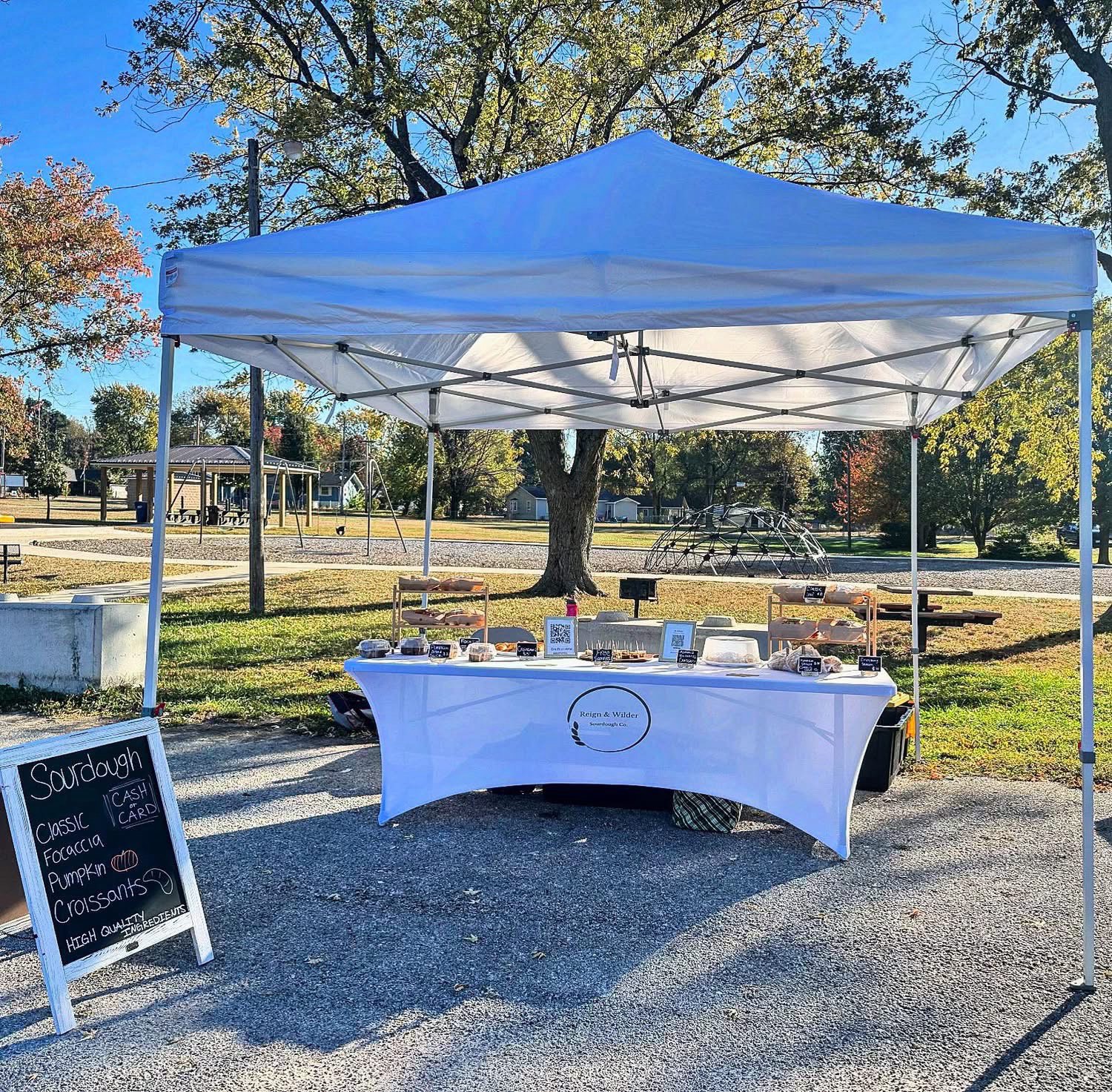 Reign and Wilder market booth setup