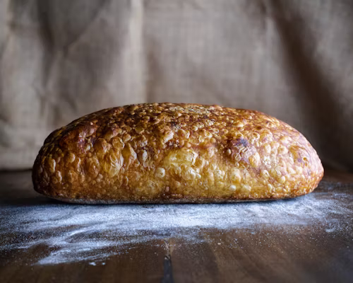 Finished sourdough loaf with browned crust